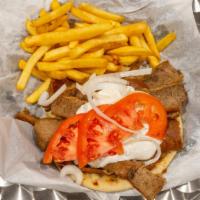 Gyro Sandwich · Gyro meat, tomatoes, onion and gyro sauce served in pita bread.