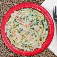 Shrimp Fettuccine Alfredo · Sautéed shrimp, spinach and diced tomatoes, in our old bay spiced alfredo sauce, served over...