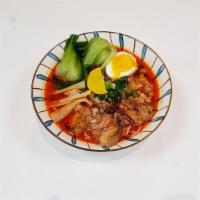 Spicy Miso Ramen · Choice of Pork or Chicken. Thin noodles served with soft boiled egg, green onion, bok choy, ...