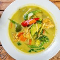 Green Curry · Very spicy. Thai green curry with Thai eggplant, bell pepper, bamboo shoots and basil.