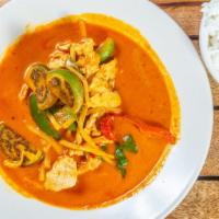 Red Curry · Very spicy. Thai red curry with Thai eggplant, bell pepper, bamboo shoots and basil.