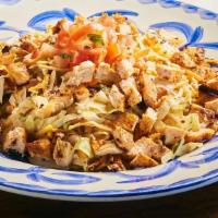 Chipotle Chop Salad · Shredded lettuce with chicken breast, roasted corn salsa, bacon bits, cheddar cheese, pico d...