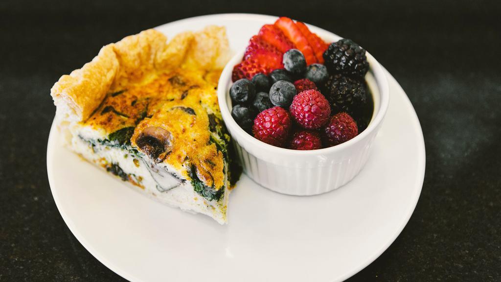Quiche Of The Day · Served with choice of side.