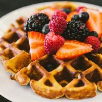 Bread Pudding Waffle · Berries, powdered sugar, 100% pure maple syrup.