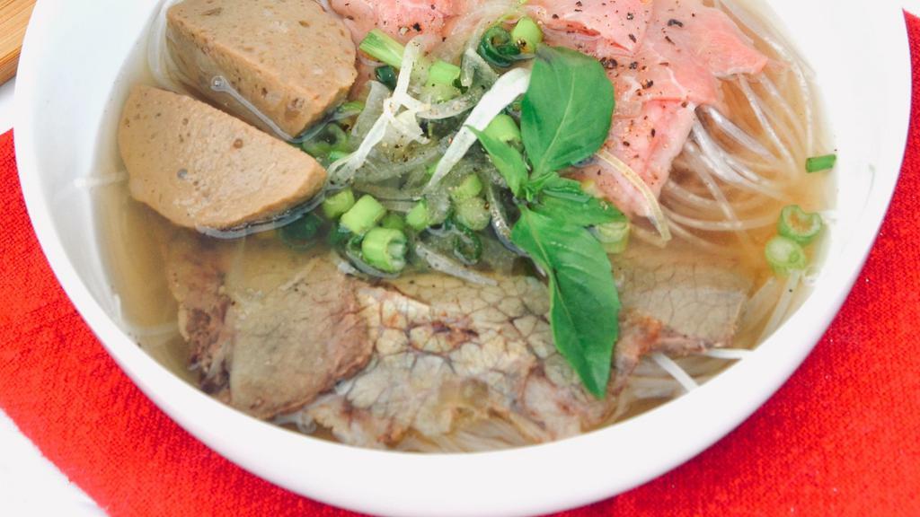 Pho Superbowl · Everything you would want in Pho in one bowl! An eye-round steak grouped with a well-done flank, beef meatball, and more. With the noodles and beef broth, it creates the perfect Super Bowl of Pho. The Super Bowl comes with a side of beansprouts, Thai basil, jalapeno, and lime.