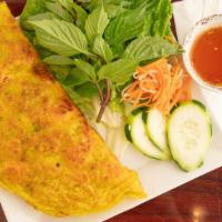 Vietnamese Crispy Crepe /  Bánh Xèo Việt Nam · A fried Vietnamese crepe with beansprouts, shrimp, and more with a side of pickled radish, T...