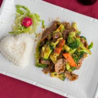 Broccoli Beef · Served with steamed rice or brown rice.