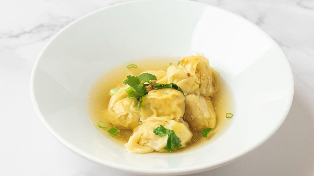 Wonton Soup · Dumplings stuffed with chicken seasoned with soy sauce and herbs, gently simmered in clear chicken broth.