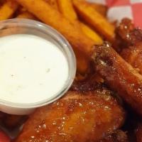 Honey Bbq Wings (5 Pieces) & Sweet Potato Fries · Crispy chicken wings tossed with honey BBQ dressing. Served with sweet potato fries and Parm...
