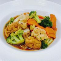Vegan Mixed Vegetables Stir Fry · Broccoli, napa cabbage, carrot and cauliflower stir-fried with your choice of protein in sav...