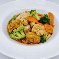 Mixed Vegetables Stir Fry (Gluten Free Sauce) · Broccoli, napa cabbage, carrot and cauliflower stir-fried with your choice of protein in sav...