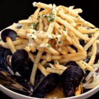 Pan Roasted Mussels · Served with a pile of fries topped with a lemon garlic aioli