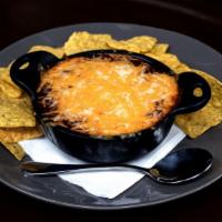 Phoenix Chili · Our classic chili made with local ground beef, onions, and peppers, topped with melted chees...