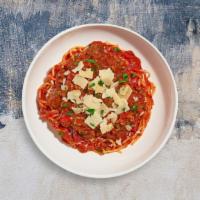Bolognese Boy Pasta · Tomato-based sauce simmered with ground beef and peas