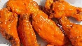 6 Chicken Wings Combo · 6 crispy chicken wings tossed in your choice of sauce. Served with fries and a drink.