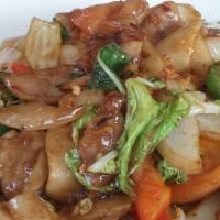 Drunken Noodle · Medium Spicy. Wide rice noodles stir-fried with choice of protein, hot chili, tomatoes, scal...