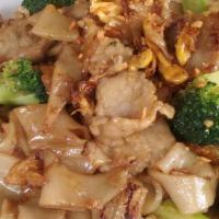 Pad See-Ew · Wide rice noodles stir-fried with choice of protein, egg, and broccoli in sweet soy sauce.