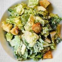 Caesar Salad · Romaine hearts, twelve month parmigiano-reggiano cheese, roasted garlic croutons