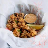 Fried Oysters · 6 fried, cornmeal crusted oysters, citrus remoulade dipping sauce, chives