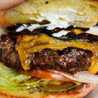 Half Pound Walrus Burger · Two house ground 4-ounce beef patties, cheddar, smoked gouda, iceberg, tomato, onion, specia...