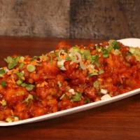 Gobi Manchurian · Cauliflower Florets coated in a manchurian sauce made from scratch (ginger and garlic, soy s...