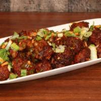 Vegetable Manchurian · Coated in a Manchurian sauce made from scratch (ginger and garlic, soy sauce, chili sauces, ...