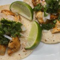 Taco Callejero (Street Taco) · Your choice of seasoned meat with diced white onions, diced cilantro and lime ( a classic).