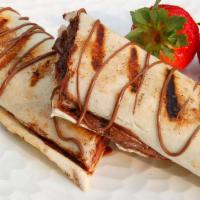 Te Quiero Mucho · Tortilla filled with nutella, marshmallow cream and Honey.