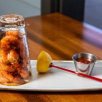 Steamed Spiced Shrimp · Gluten free. Served with classic cocktail sauce.