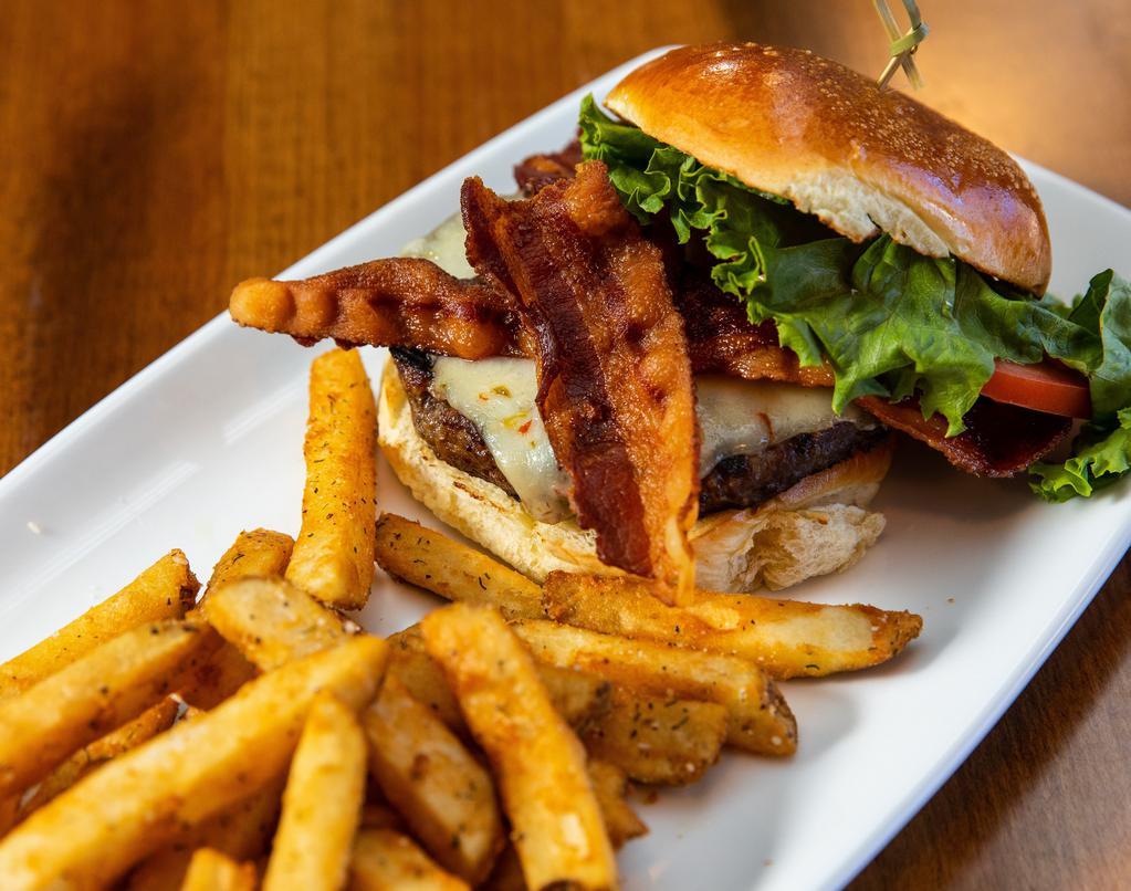 Applewood Bacon Cheeseburger · Angus burger, stack of applewood bacon, Vermont white Cheddar, Wisconsin Cheddar, tomato, crispy leaf lettuce, served on toasted brioche bun.