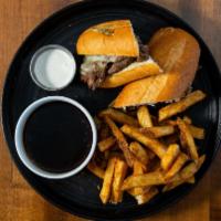 Roasted Prime Rib Dip · Thinly sliced roasted prime rib, horseradish sauce and melted provolone cheese served on a t...