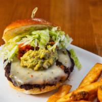 California Burger · Angus burger with house pickled jalapeños, chile Jack cheese, guacamole, served on toasted b...