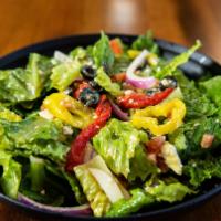 Greek Salad · Romaine lettuce, feta cheese, Kalamata olives, sliced red onions, cucumbers, roasted red pep...