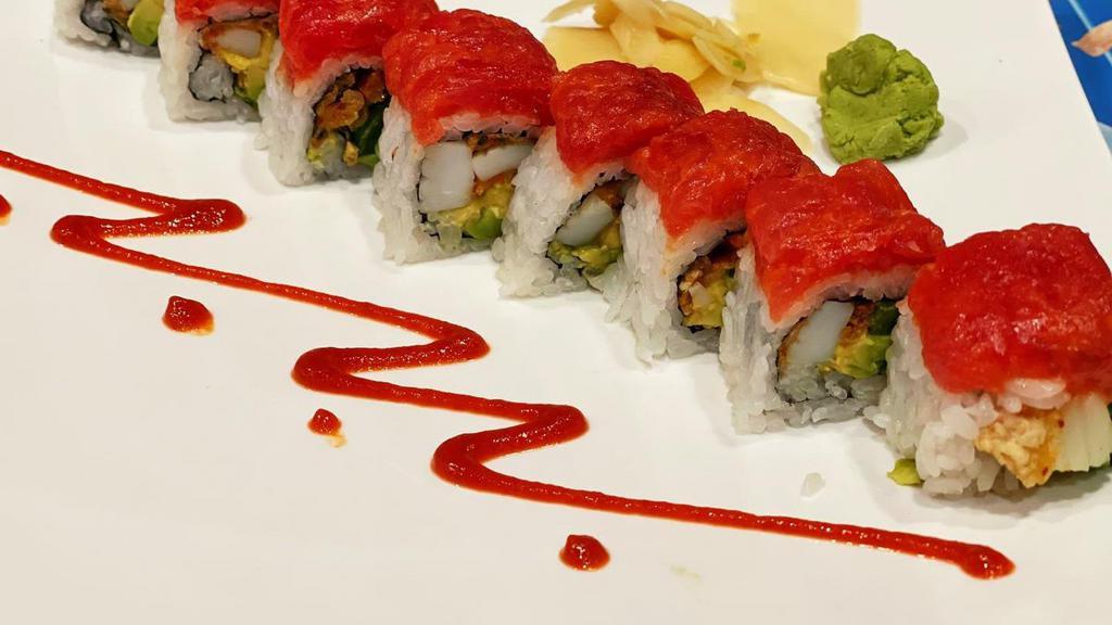Sushi & Sashimi Combo Platter · Nine pieces of assorted sashimi and five pieces of nigiri sushi and California roll.