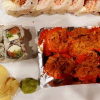Sushi Deluxe · Nine pieces of assorted nigiri sushi and tuna or California roll.