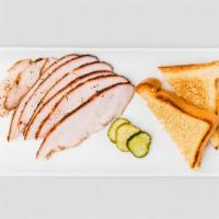 Sliced Turkey Breast · Half pound of smoked, sliced turkey breast served with Texas Toast and pickles. Allergens: w...