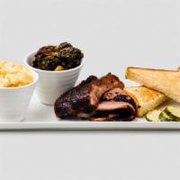 Fed Pig Two Step Combo · Two meats and Two sides served w/ Texas toast and pickles.. Allergens: wheat, soy, egg (side...
