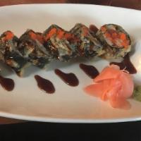 Volcano Roll Specialty Roll · Tempura roll of tuna, avocado and crabmeat with tobiko.