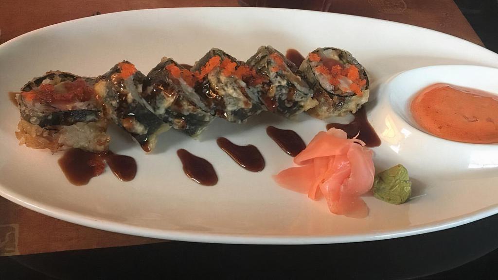 Volcano Roll Specialty Roll · Tempura roll of tuna, avocado and crabmeat with tobiko.