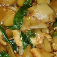 Drunken Noodles · Choice of chicken, beef or shrimp. Soft wide rice noodles stir fried with sake in a Thai bas...
