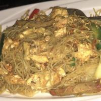Singapore Style Rice Noodles · Shrimp, chicken and pork dry tossed in an intense curry flavored rice noodle.