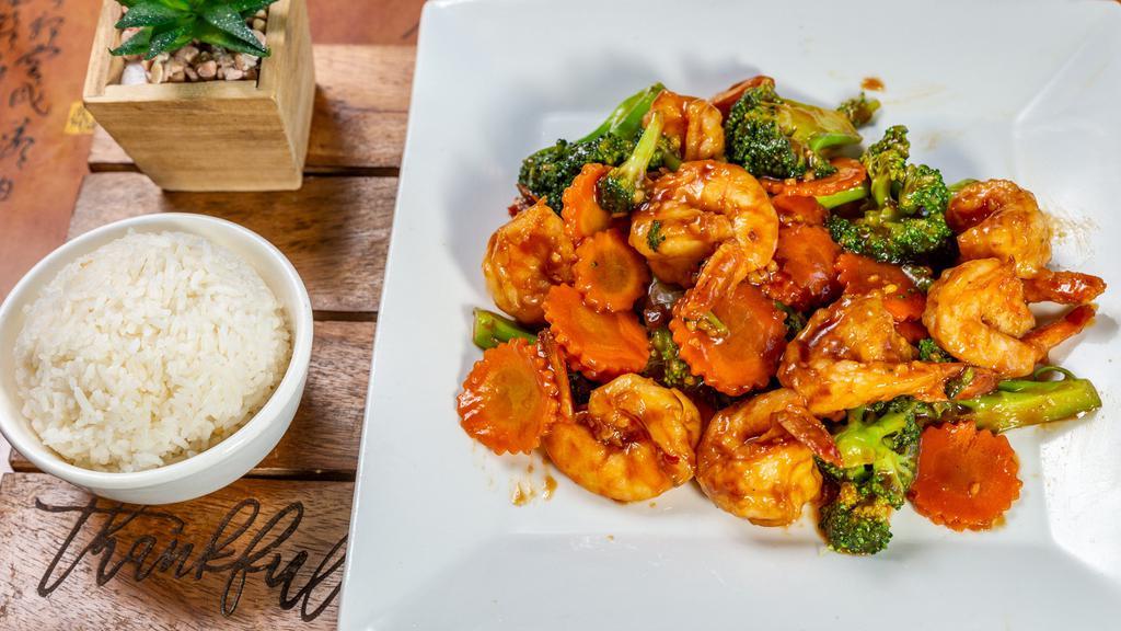 Sauteed Broccoli · Ginger, garlic, sliced carrots and sweet soy sauce.