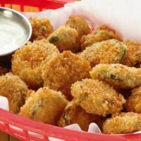 Jalapeño Bottlecaps  · Jalapeño slices battered fried and topped with Fuzzy Dust, then served with our house-made a...