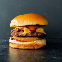 Roadhouse Steak Burger · 6 oz. Juicy steakburger topped with smoked bacon, American cheese, honey BBQ, and a jumbo on...