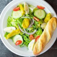 Garden Salad · Hearts of romaine, tomato, sweet red onion, cucumber, boiled egg and pepperoncini. Served wi...