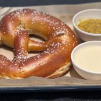 Texas Pretzel · A soft pretzel large enough for Big Tex, served with Electric Jellyfish beer mustard and che...