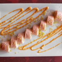 Super Crunchy Roll · Crunchy shrimp, spicy snow crab wrapped with pink soy paper with spicy cream sauce.
