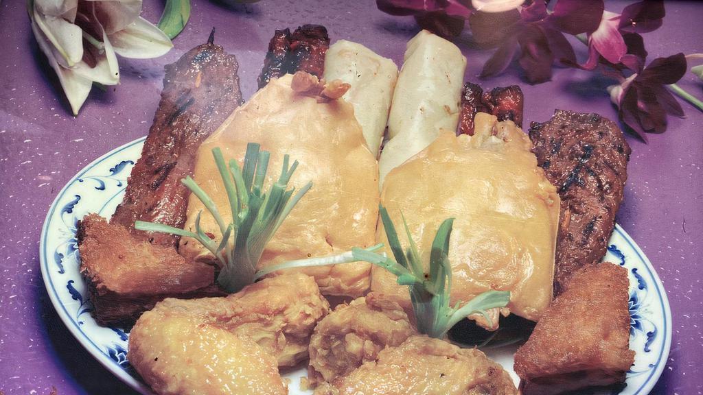 Pu Pu Platter (For 2) · Two chicken wings, two teriyaki beef, two shrimp toast, two barbeque spare ribs, three fried jumbo shrimp, two spring roll.