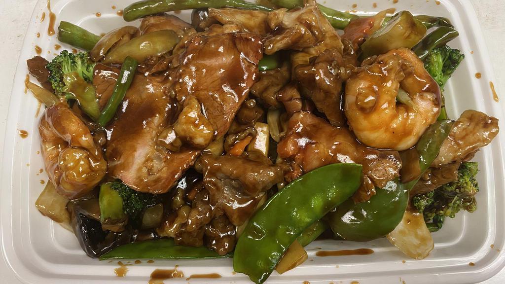 4 Seasons · Shrimp, chicken, beef,  roast pork sautéed with vegetables in brown sauce