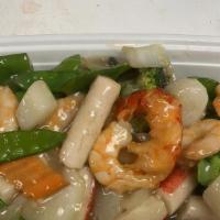 Seafood Delight · Lobster meat, imitation crab meat,  shrimp,  and scallops  sautéed with mixed vegetables in ...